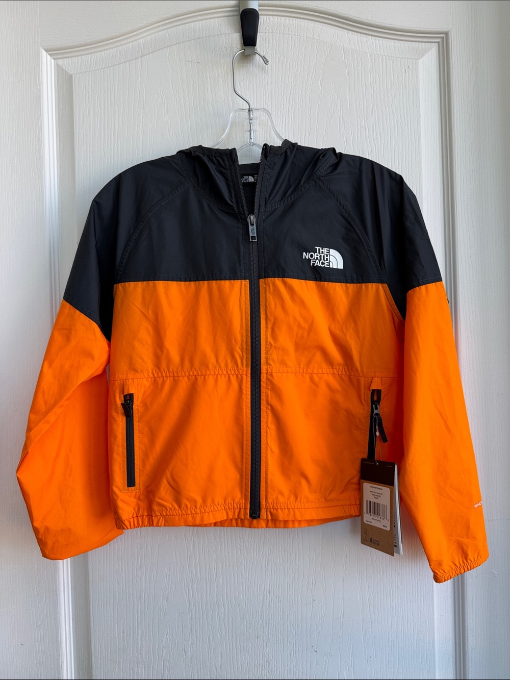 The North Face Kids Orange and Black Hooded Rain Jacket